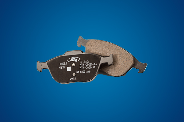 Bison Ford Service Offer - Motorcraft Brake Pads Ford Brake Pads Isolated On Blue Background