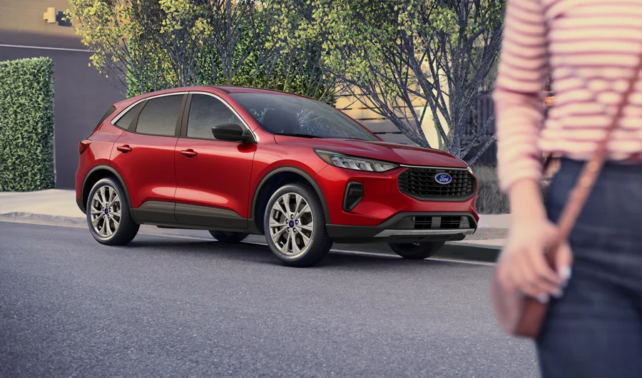 Value Your Trade in Seconds at Mathieu Ford! Ford Escape Parked on Street
