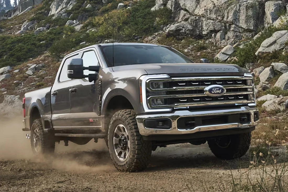 Ford Superduty shown Ford Superduty driving on dirt path
