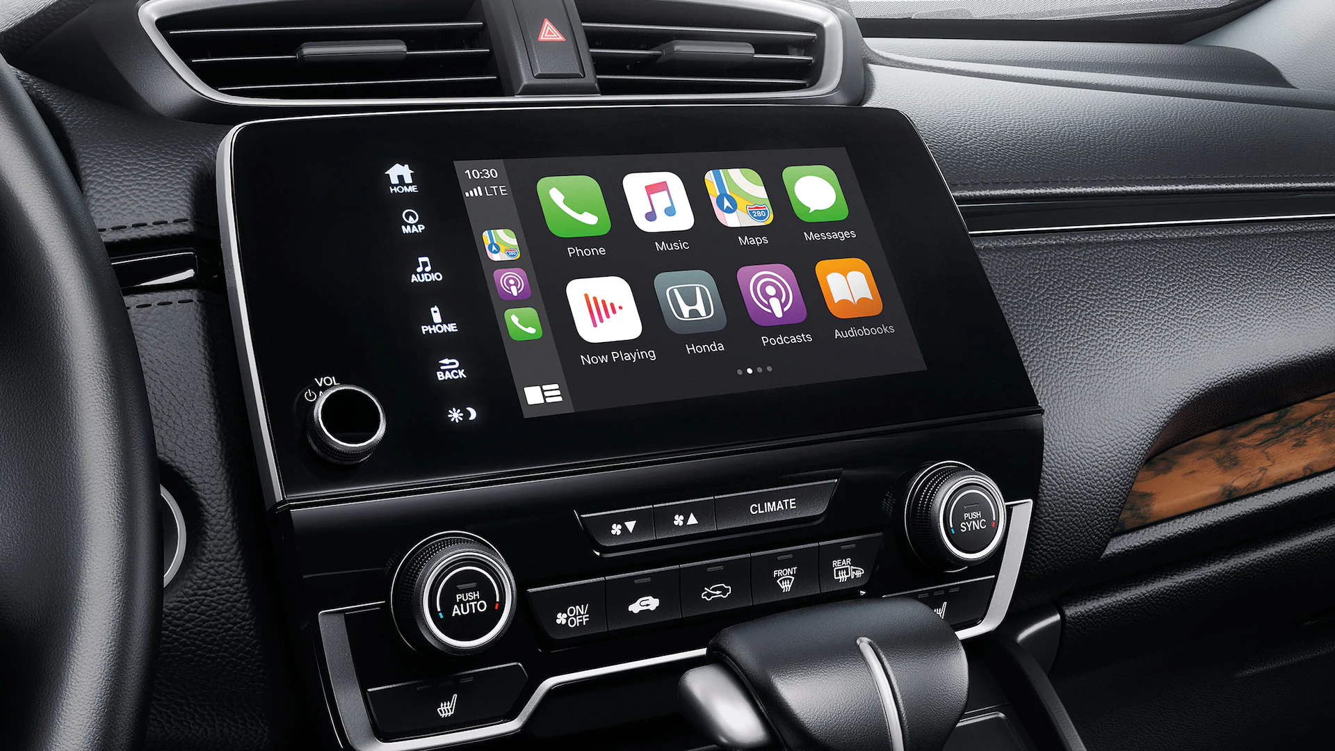 2021 Honda CR-V Technology Touring shown with Black Leather. Apple CarPlay® integration and Display Audio touch-screen standard on EX and above.