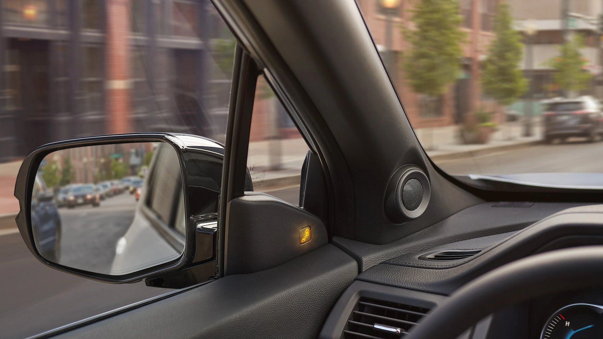 2021 Honda Passport Safety Elite shown in Modern Steel Metallic. Blind spot information (BSI) system with cross traffic monitor standard on EX-L and above. Image enhanced for demonstration purposes.