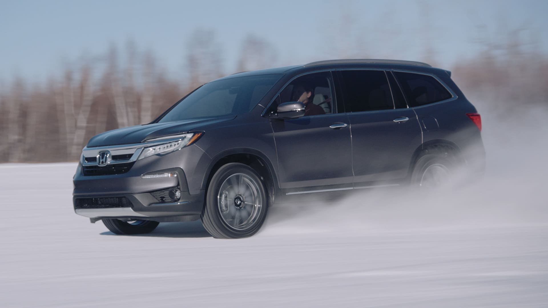 2022 Honda Pilot Capability 2022 Honda Pilot driving through the snow