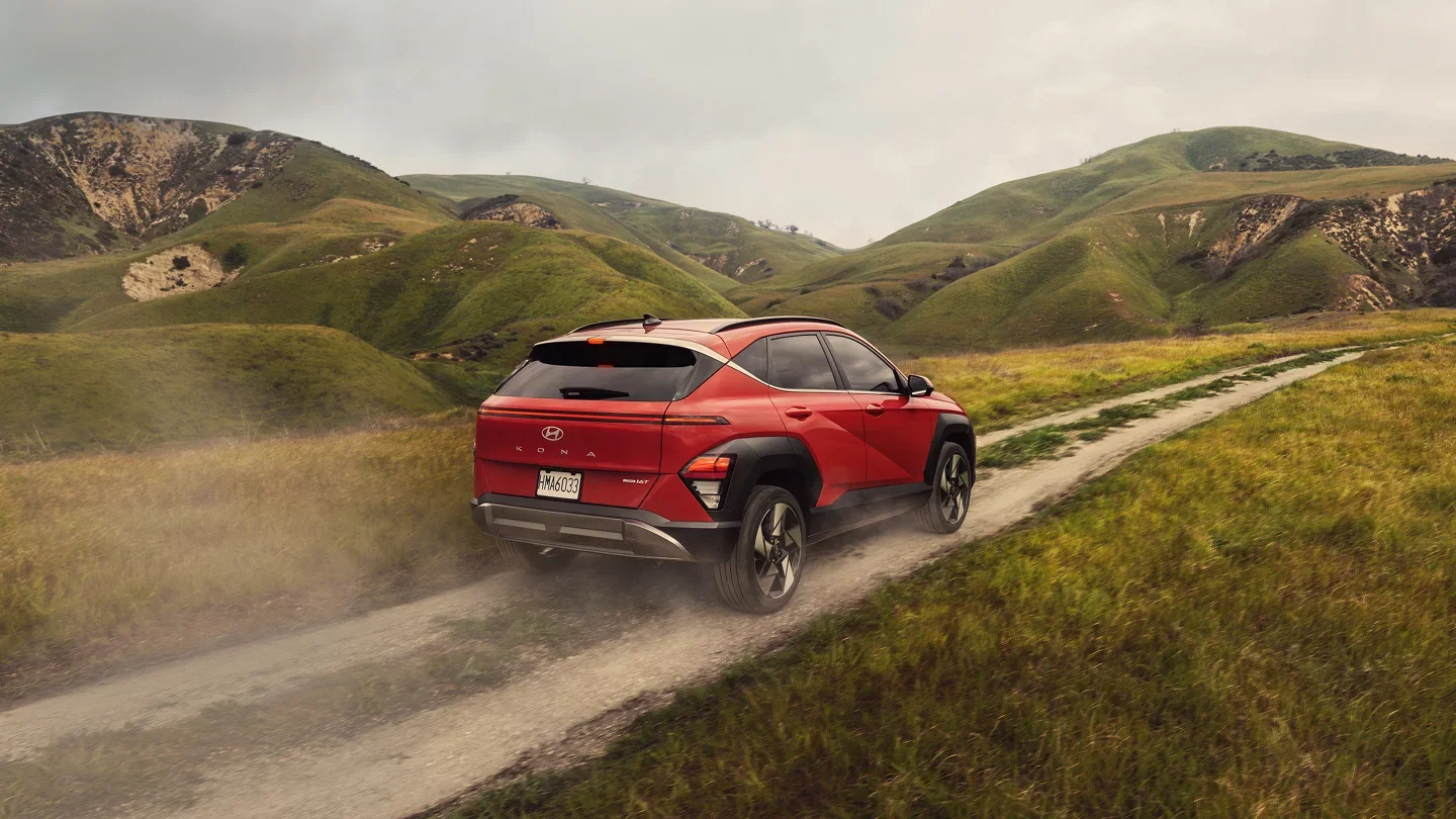 2024 Hyundai Kona - Performance 2024 Hyundai Kona driving down dirt road