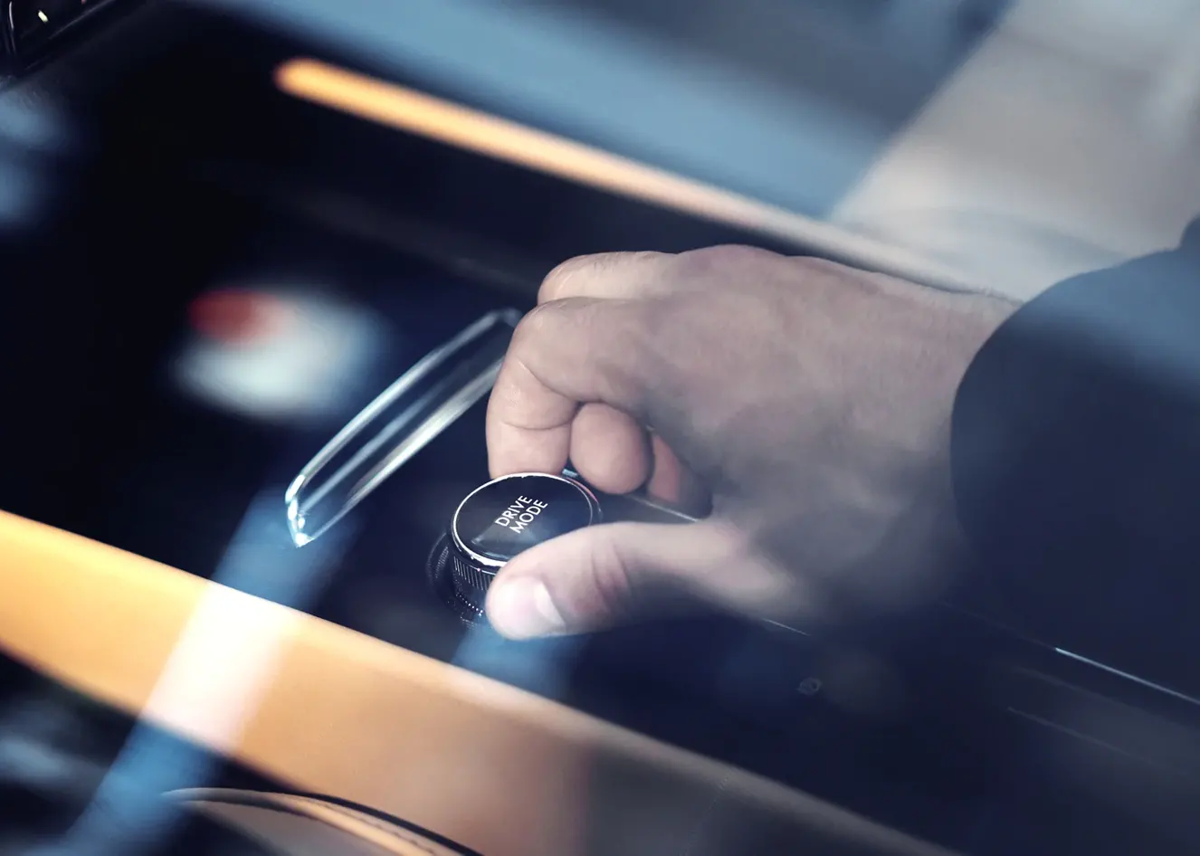 2021 Lincoln Corsair - Performance Man with his hand on the drive-mode dial