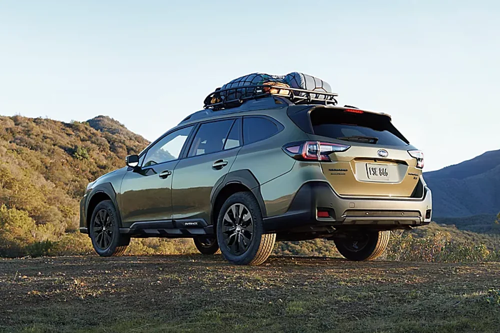 Pre-Owned Subarus Subaru Outback parked on dirt