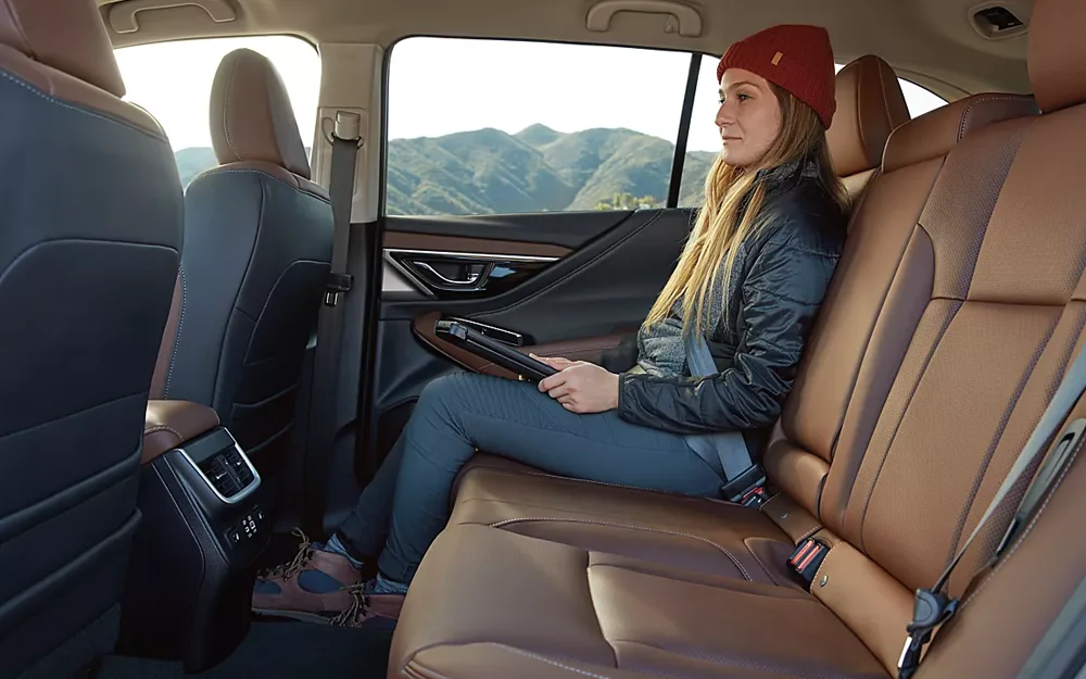2024 Subaru Outback - Design passanger in the backseat of an Outback