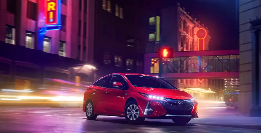 2021 Toyota Prius Prime Power Prius Prime driving down city streets