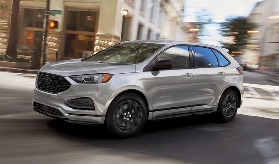 Ford Edge driving down street