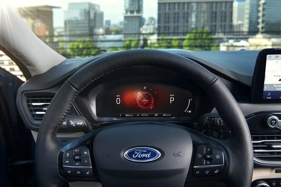 2022 Explorer Hybrid parked on rooftop parking lot with head on view.