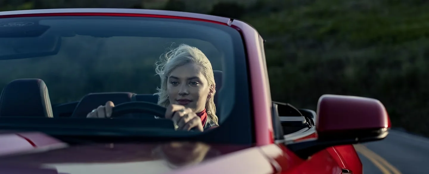 Girl driving the 2024 Ford Mustang