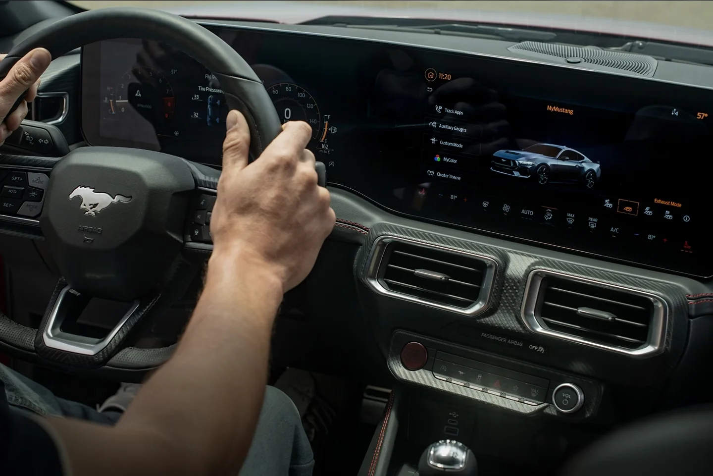 Hands on a 2024 Ford Mustang steering wheel