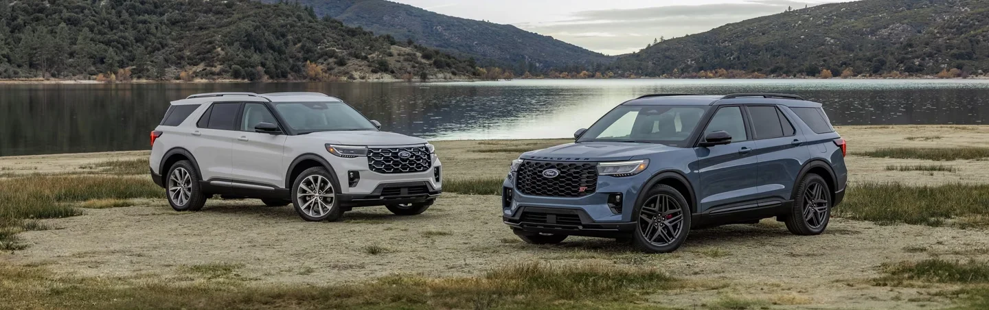 2025 Ford Explorers parked by a lake