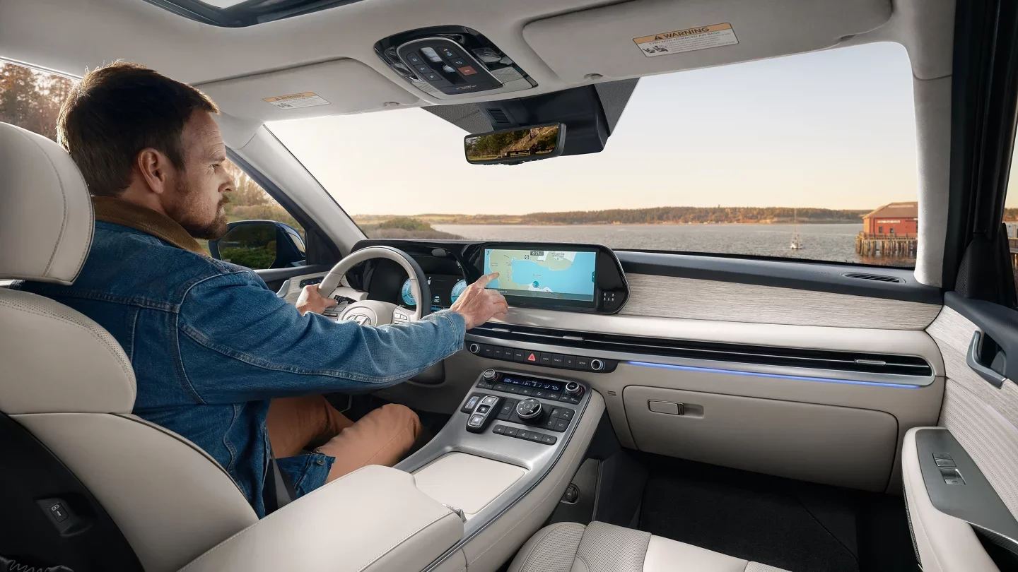 2025 Hyundai Palisade Man Using 12.3 Inch Display