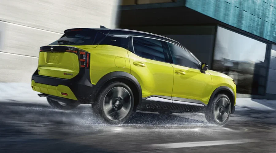 2025 Nissan Kicks Driving Through Snow