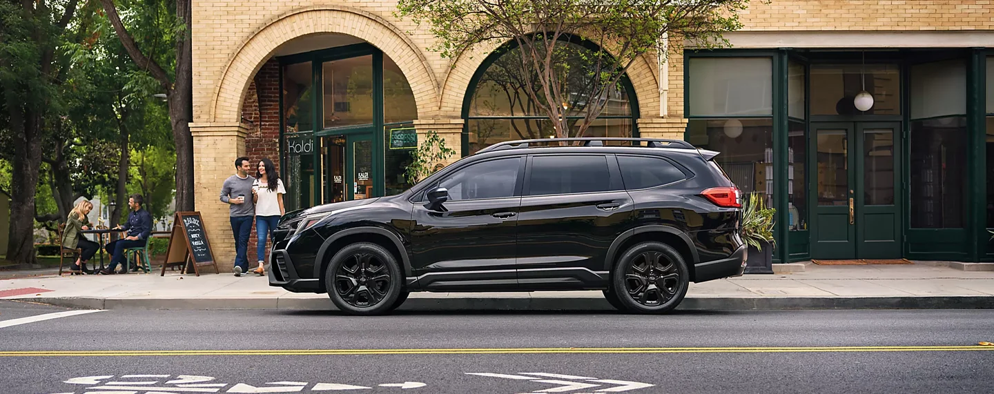 Subaru parked on city street